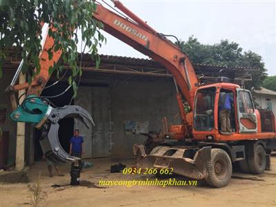 lắp đặt bộ kẹp đá (kẹp gỗ, kẹp mía) lắp cho xe cuốc tại Việt Nam